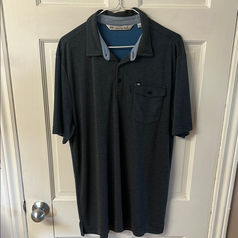 Travis Mathew blue golf polo shirt with chest pocket men’s size L